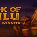 Book of Zulu Slot su Winnita - Tamburi tribali e libro magico nella savana africana al tramonto