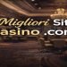 Interno di casinò reale con tavoli da gioco e slot machine, immagine guida sui migliori siti casino .com